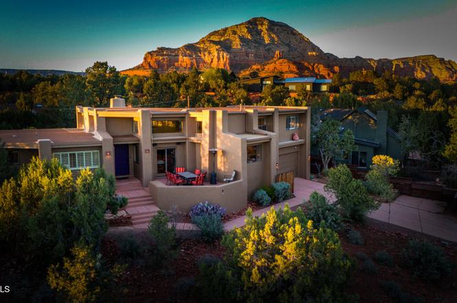 Piñon — adobe exterior with Cathedral Rock backdrop, Sedona