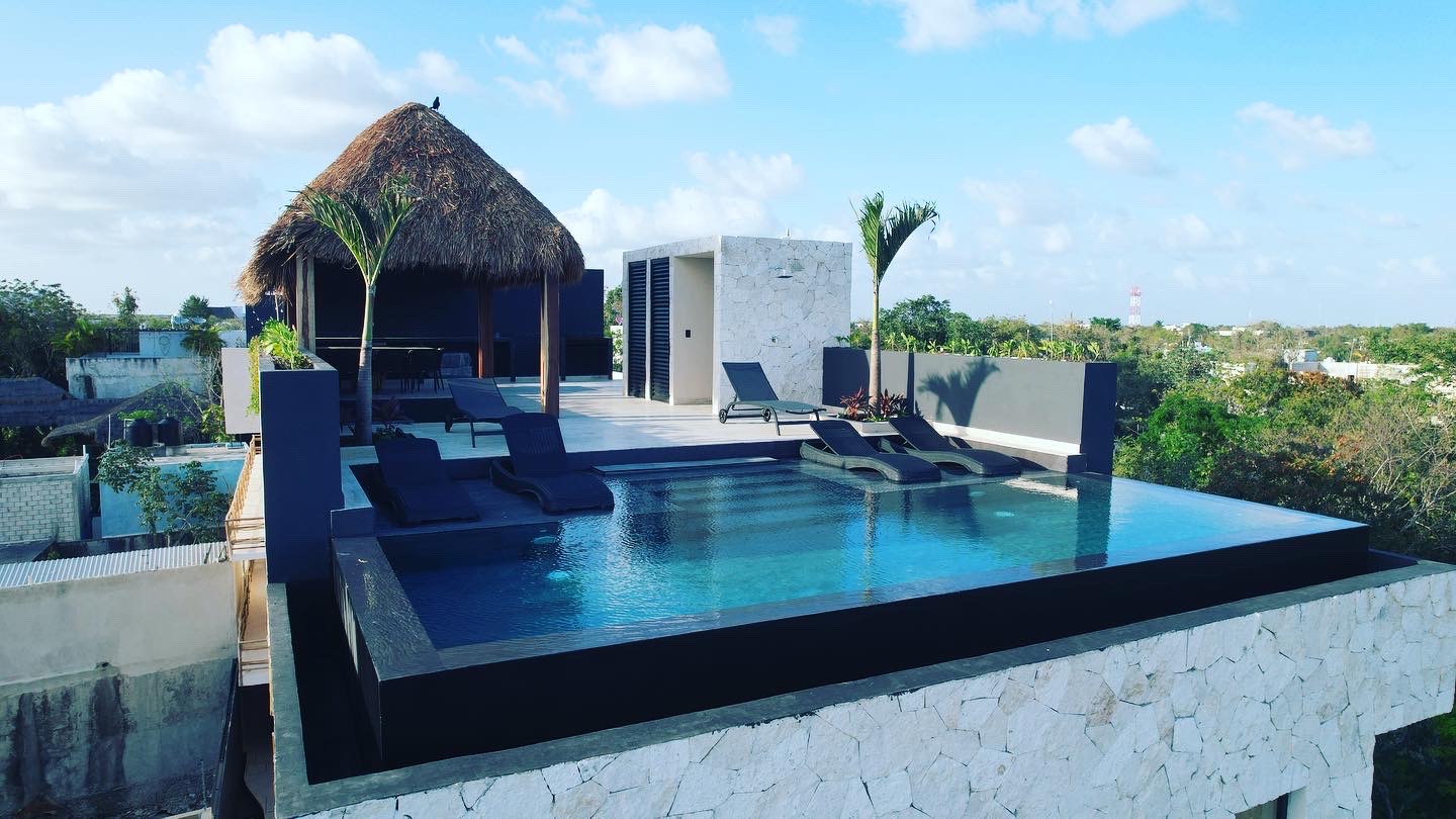 Rio's Penthouse — rooftop plunge pool and palapa, Tulum
