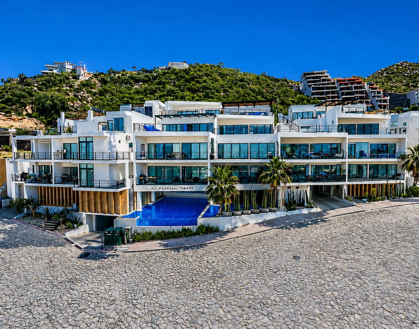 Pedregal Towers from the cobblestone street