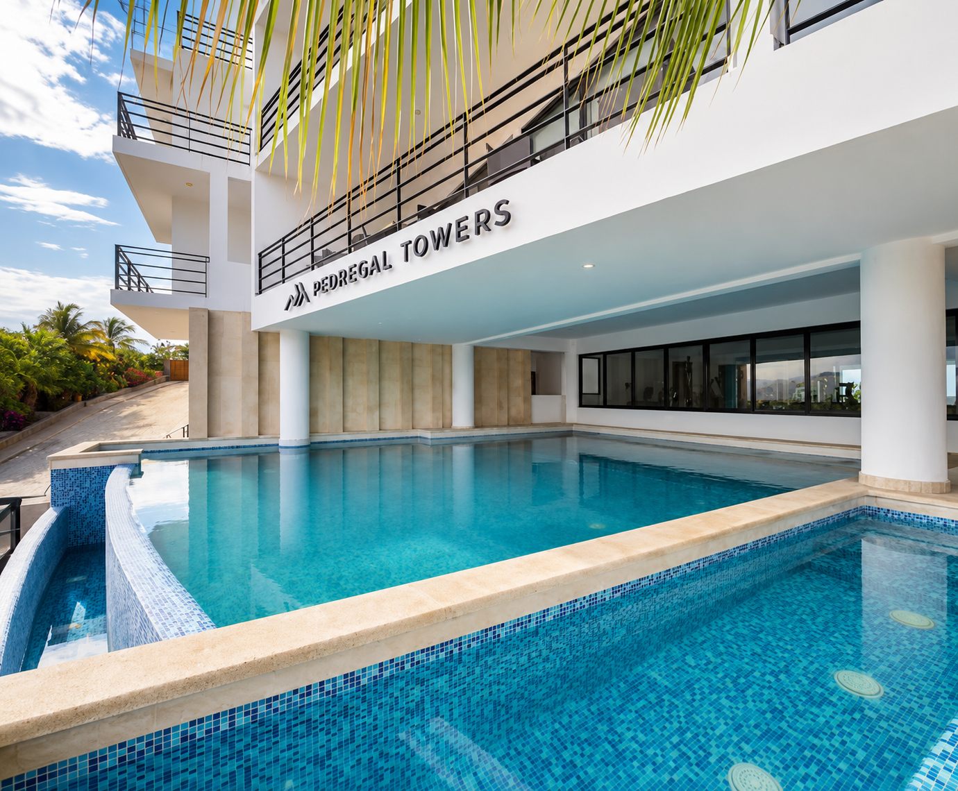 Pedregal Towers entrance and ground-floor pool deck