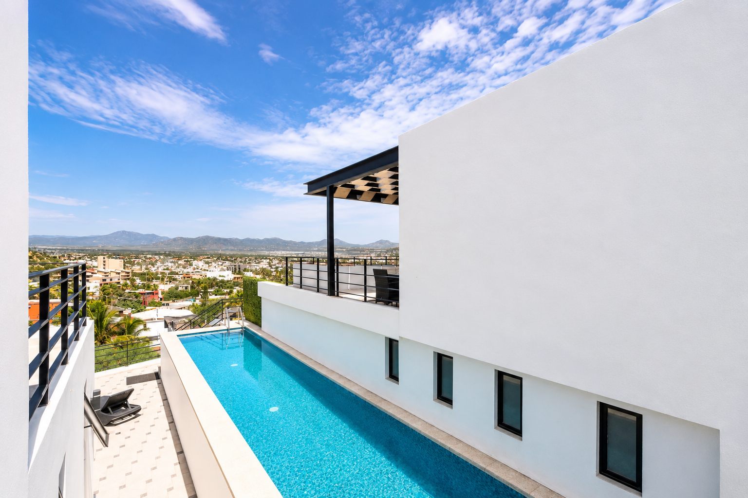 Rooftop lap pool at Pedregal Towers