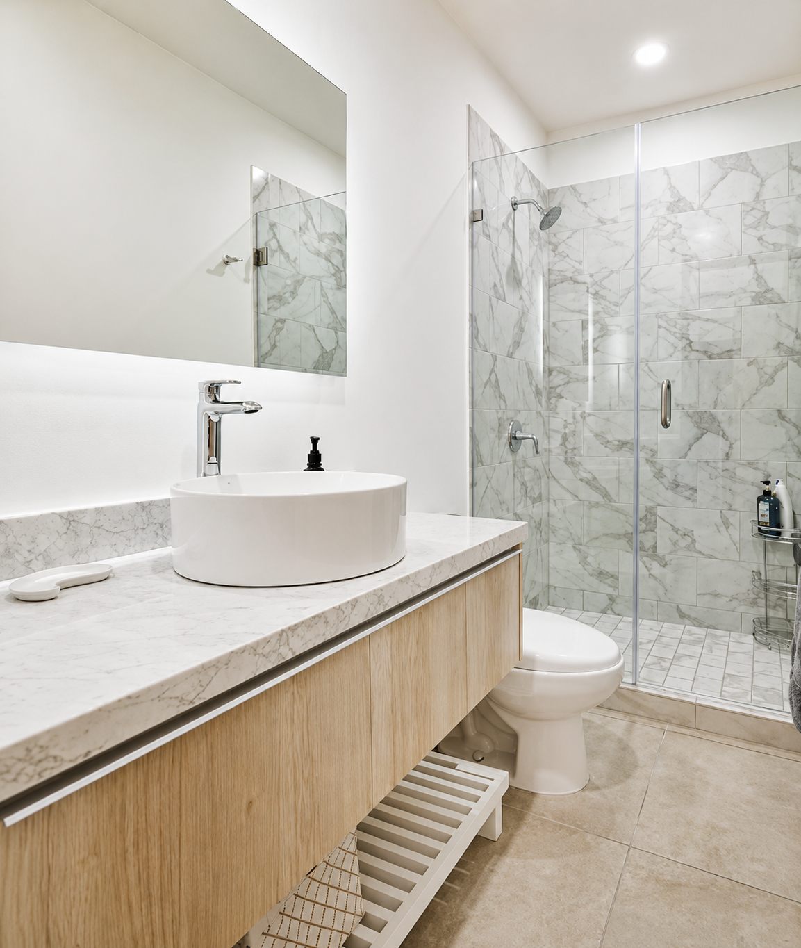 Guest bathroom with vessel sink and glass shower