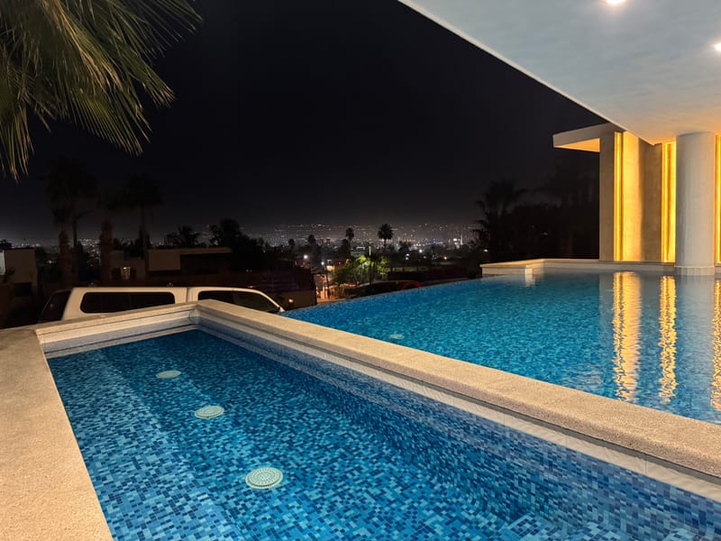 Night swim at Pedregal Towers pool — an evening favorite for guests at our Cabo San Lucas vacation rental