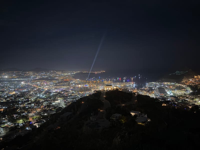 Night hike in Pedregal — Cabo San Lucas city lights below our Pedregal Towers vacation rental