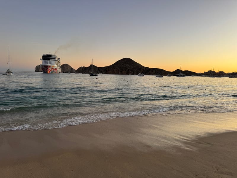 Medano Bay — pirate ship cruises and beach clubs a short Uber from our Cabo Airbnb rental