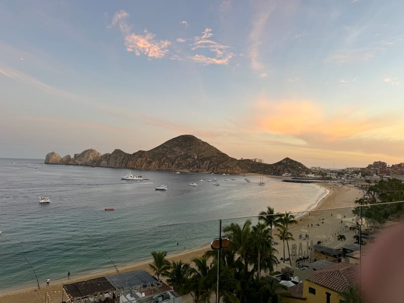 Medano Beach — the swim-friendly bay about 25 minutes walking, or a short Uber from our Cabo San Lucas vacation rental