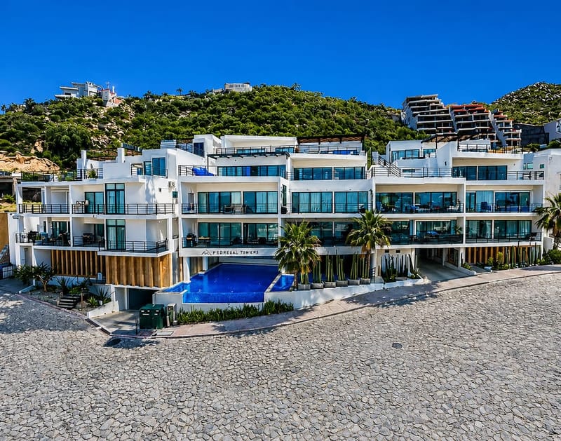 Pedregal Towers building street view in Cabo San Lucas — the actual condo building, inside the gated Pedregal community