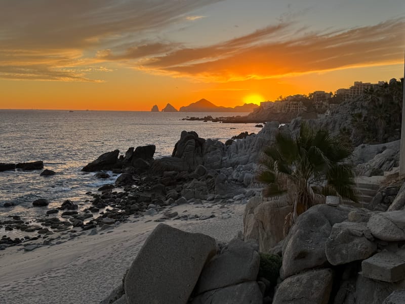 Sunset on Pedregal beach — a guest favorite from our Cabo vacation rental Airbnb and VRBO listings