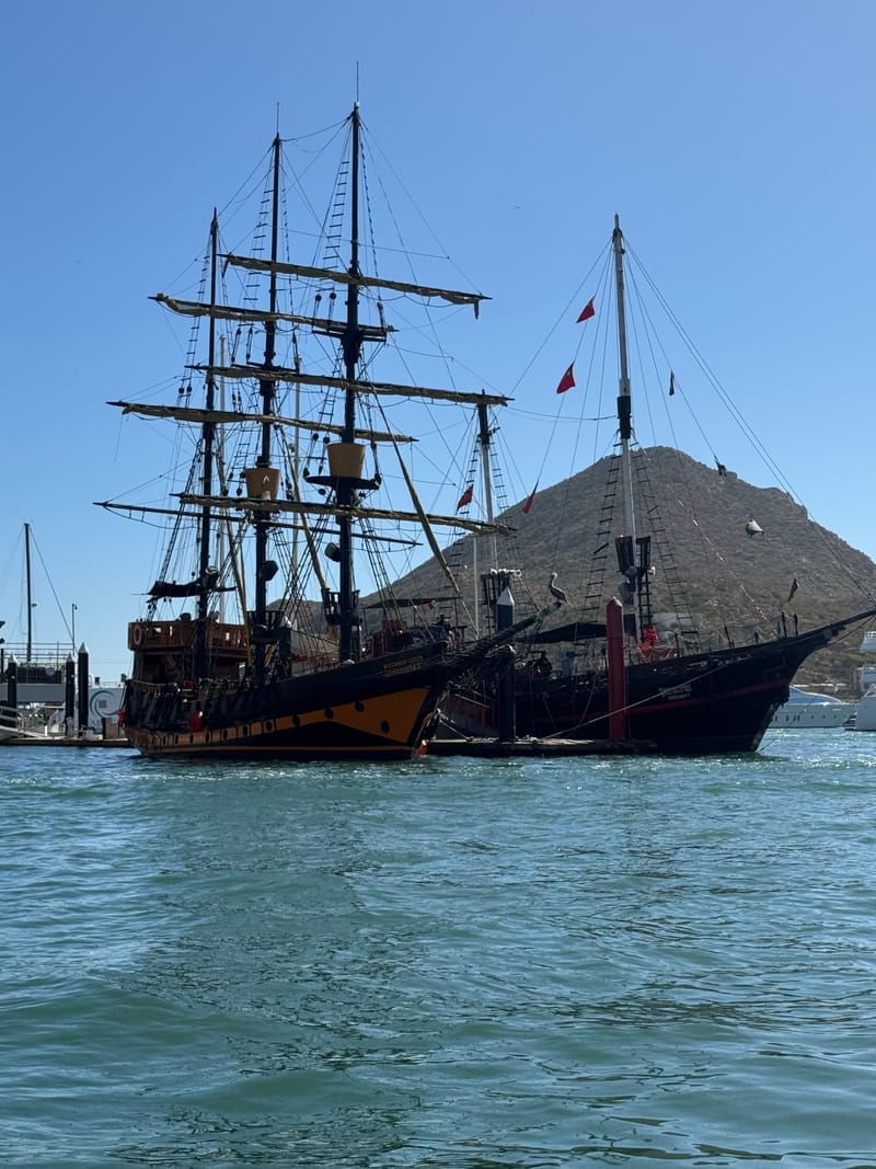 Pirate ship cruise leaving Cabo San Lucas Marina — a popular booking for Airbnb and VRBO guests at Pedregal Towers